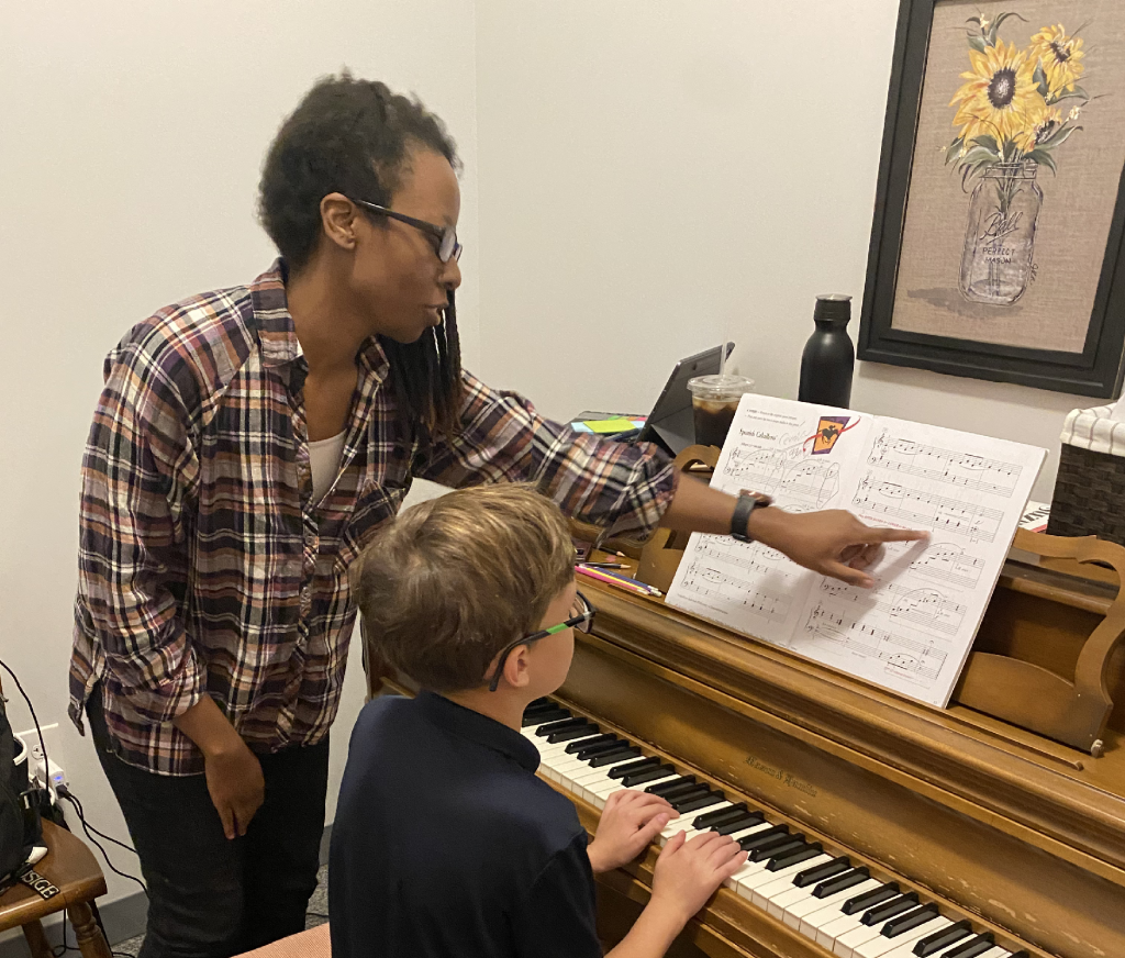 Professional music evaluator providing constructive feedback to a student musician