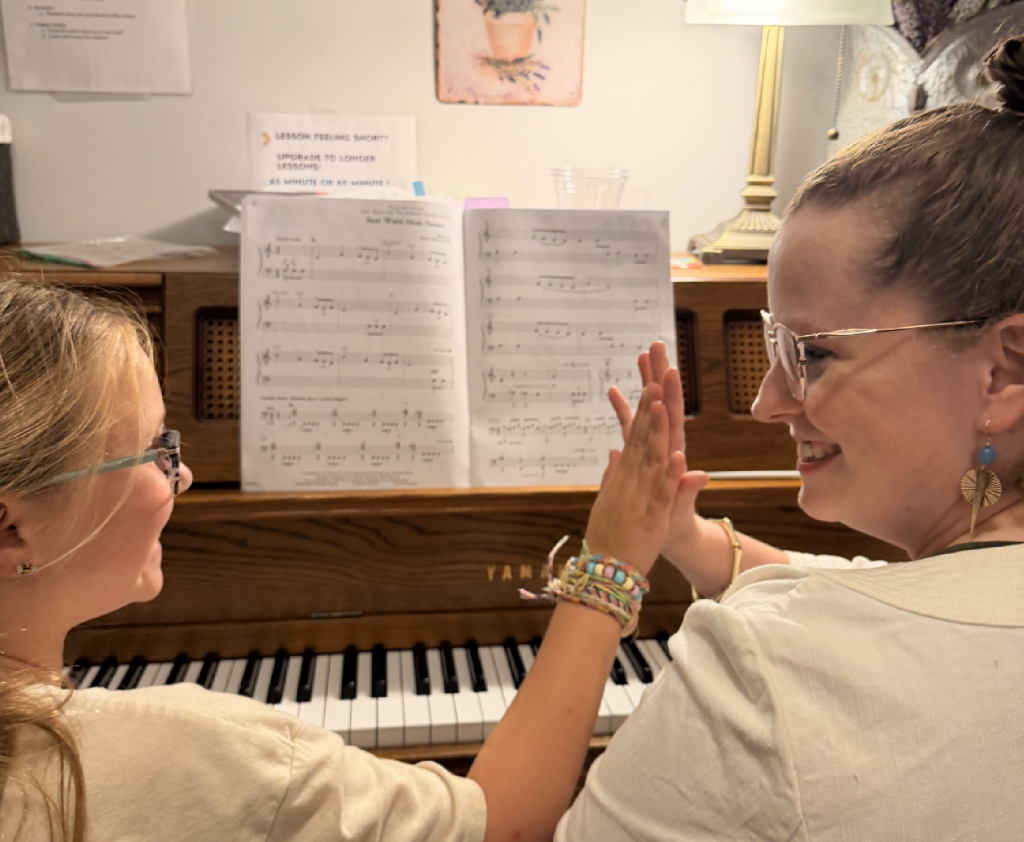 Music student working with a teacher on individualized goals and musical development