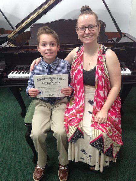 Young Jam Band students celebrating their graduation at Chambers Music Studio in Columbus, Ohio.