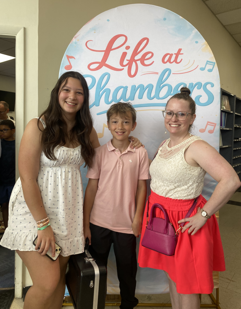 Julie Chambers smiling with a student performer at the Life at Chambers Festival in Columbus, Ohio.