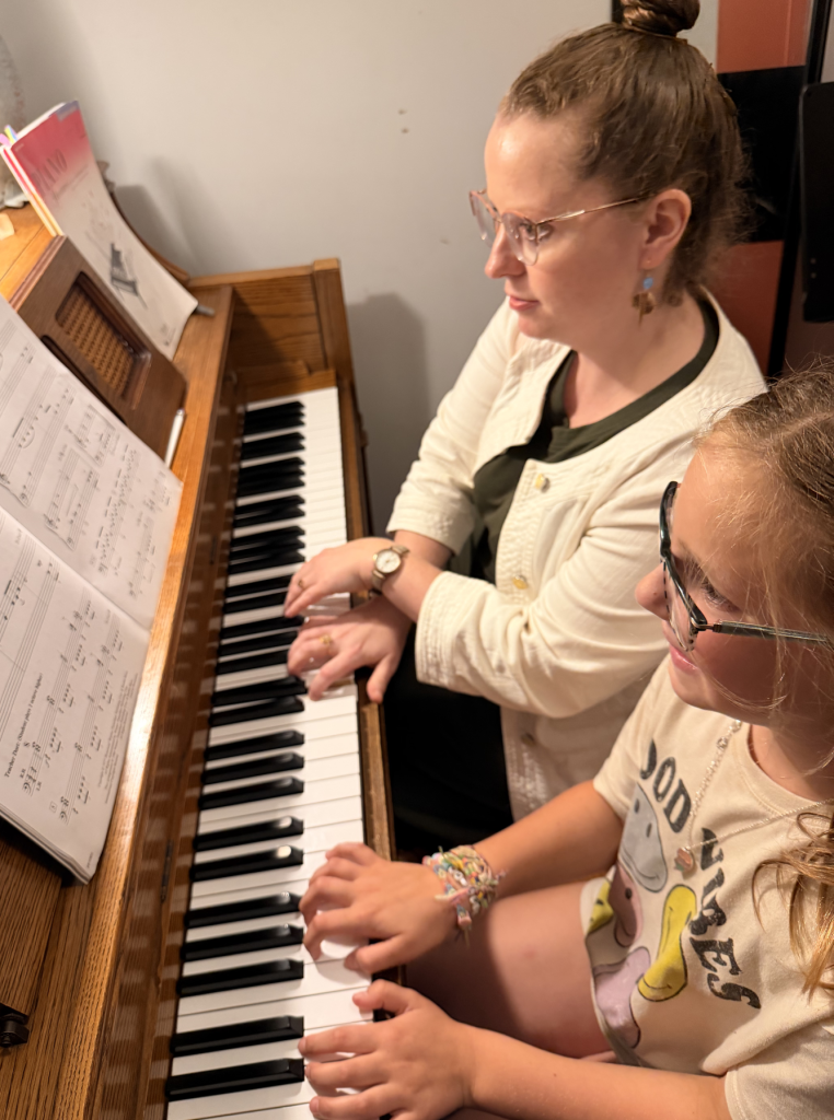 Julie Chambers coaching a student musician during a supportive Master Class in Columbus, Ohio.