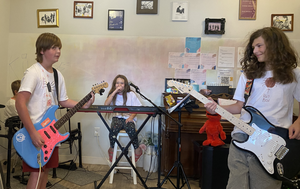 Students making music together during a Chambers Music Studio Summer Camp in Columbus, Ohio.