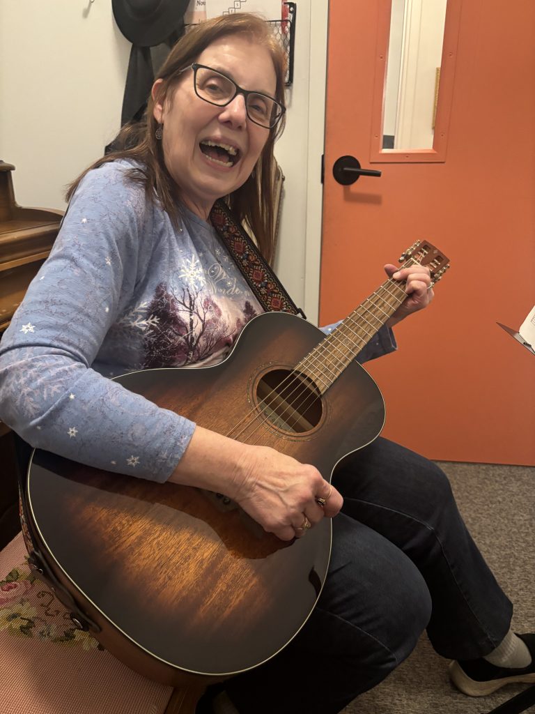 Adult music student taking a piano lesson at Chambers Music Studio near Columbus Ohio