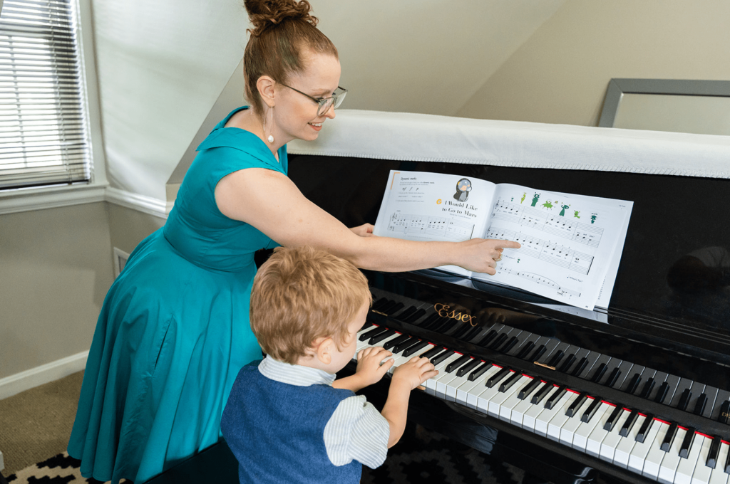 Five year old student in private piano lessons at Chambers Music Studio in Worthington, Ohio, developing technique, musical fluency, and expressive musicianship.